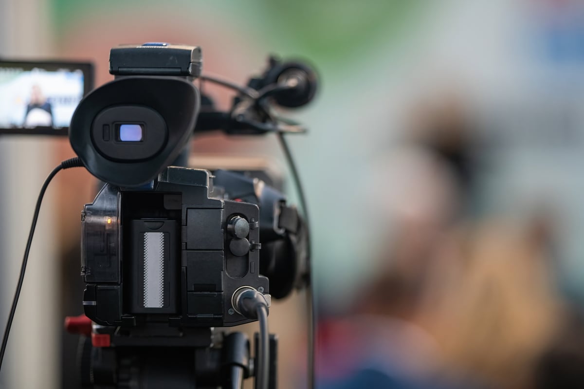 Camera capturing moments at a dynamic event