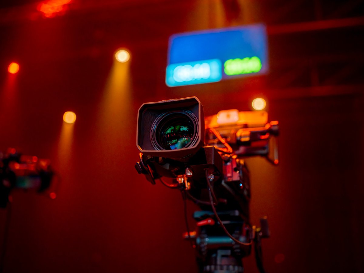 Professional cinema camera on rig with studio lighting
